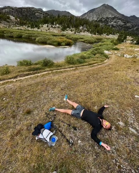 Thomas taking a well-earned rest at an alpine lake